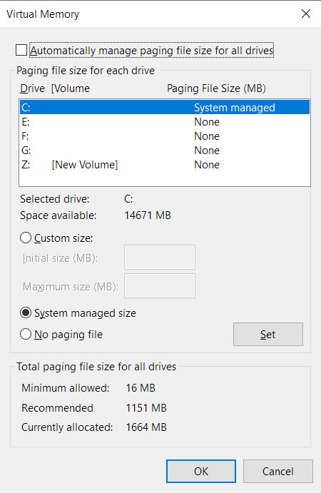 Desmarque "Administrar automáticamente el tamaño del archivo de paginación para todas las unidades" y seleccione su unidad principal de Windows.