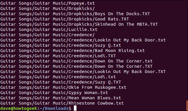 Ekstrak file tar lagu gitar di folder Downloads