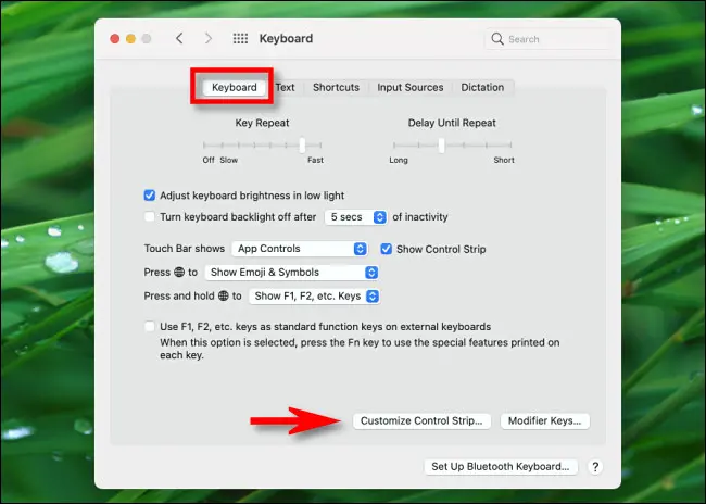 Di Preferensi Keyboard, klik "Sesuaikan Strip Kontrol."