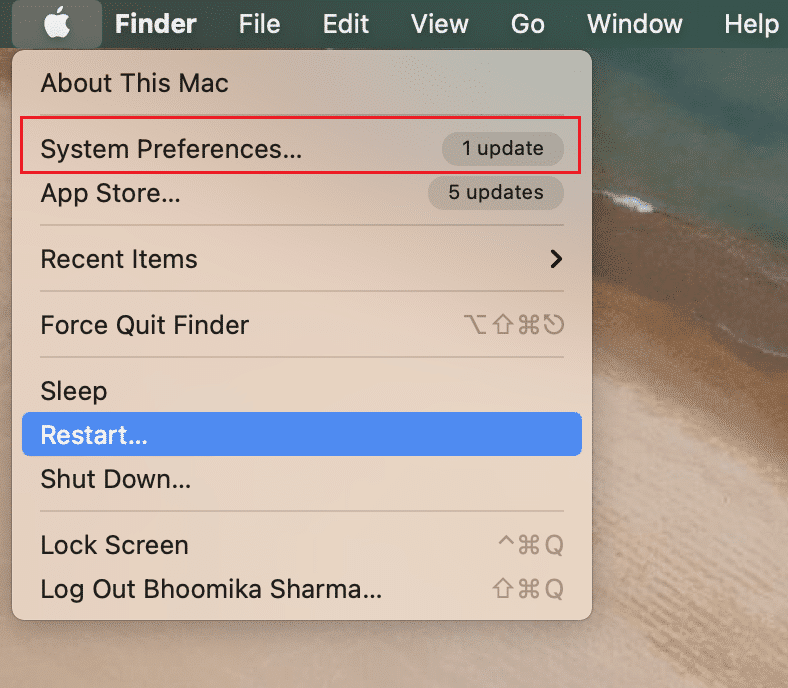 Buka System Preferences... di MacBook