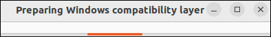 La boîte de dialogue affichée pendant que Wine configure ses couches de compatibilité