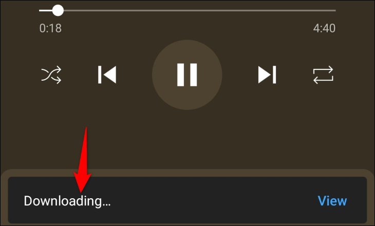 Mensaje "Descargando" de YouTube Music.